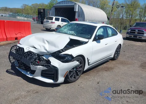 2022 BMW M440I Gran Coupe xDrive z USA, uszkodzony, nr VIN WBA13AW09NFM04876